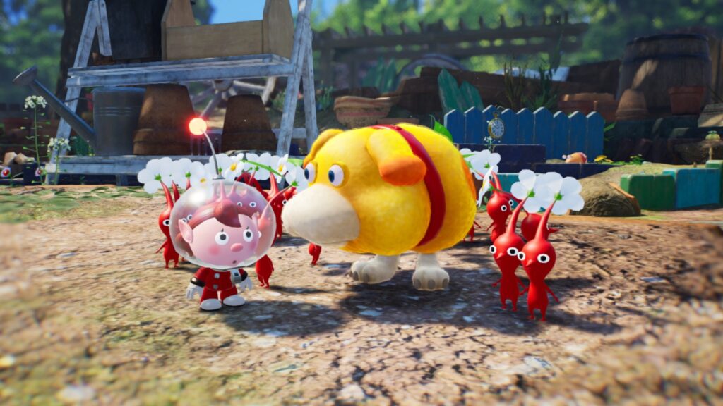 Pikmin 4 screenshot met de speler, Oatchi de hond en rode pikmin in een tuin.