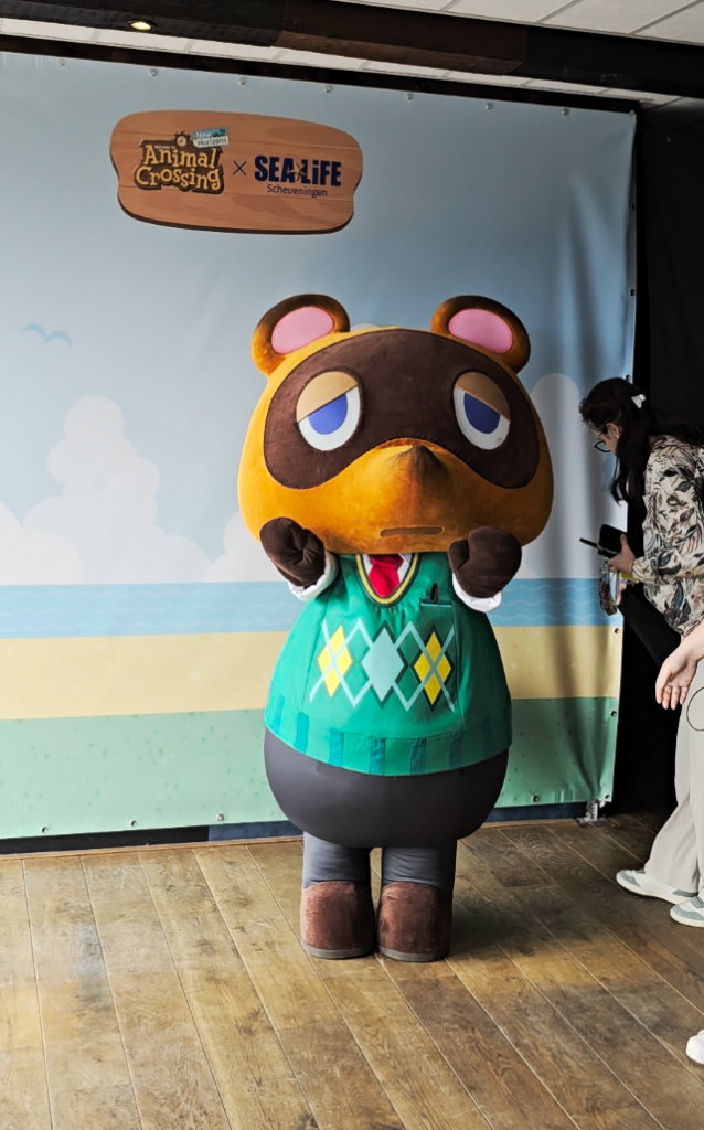 SL X AC Tom Nook photo op